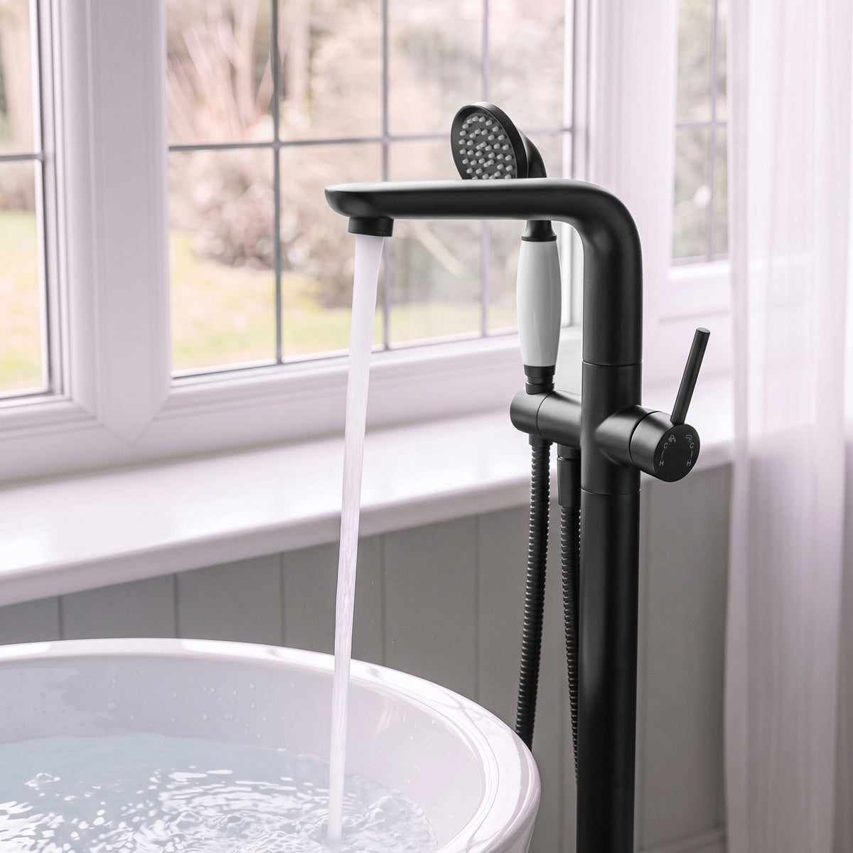Floor-Mounted Bathtub Faucet with Hand Shower and Swivel Spout