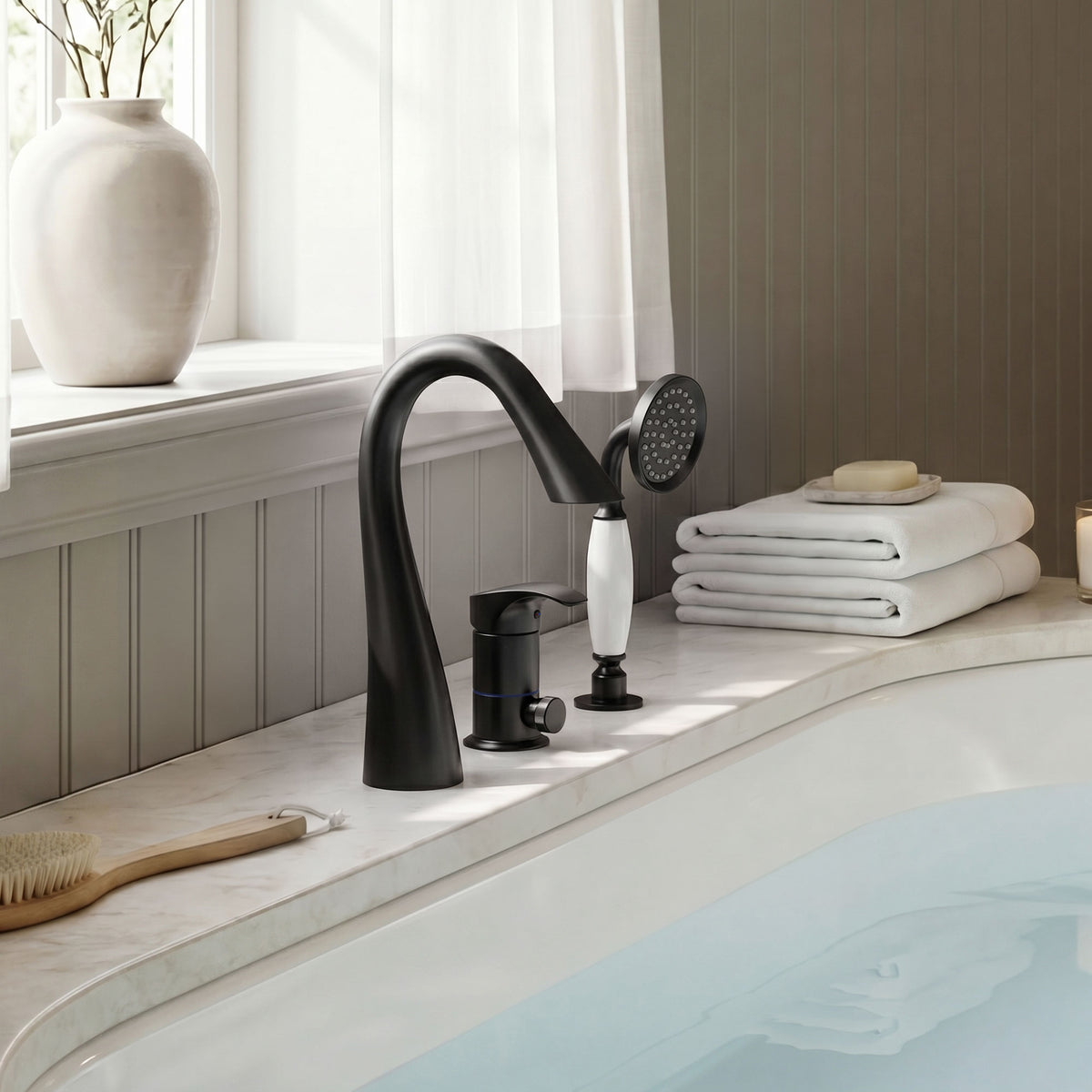 Single-Handle Deck-Mount Tub Faucet with Handheld Shower and Curved Spout