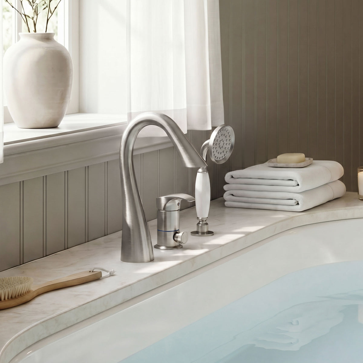 Single-Handle Deck-Mount Tub Faucet with Handheld Shower and Curved Spout