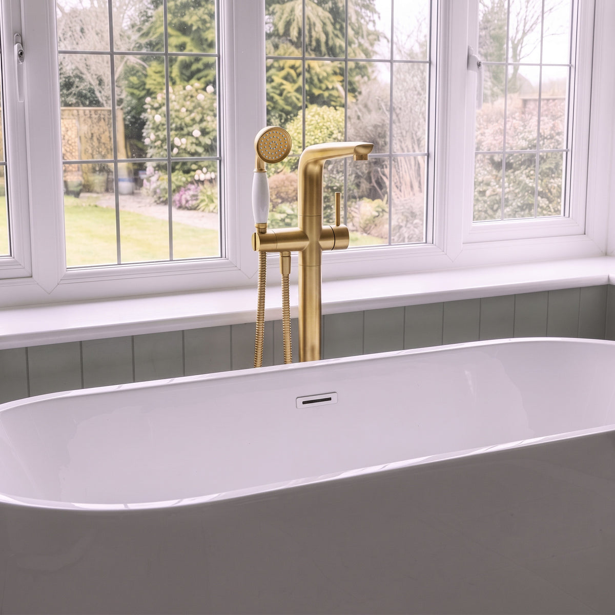 Floor-Mounted Bathtub Faucet with Hand Shower and Swivel Spout