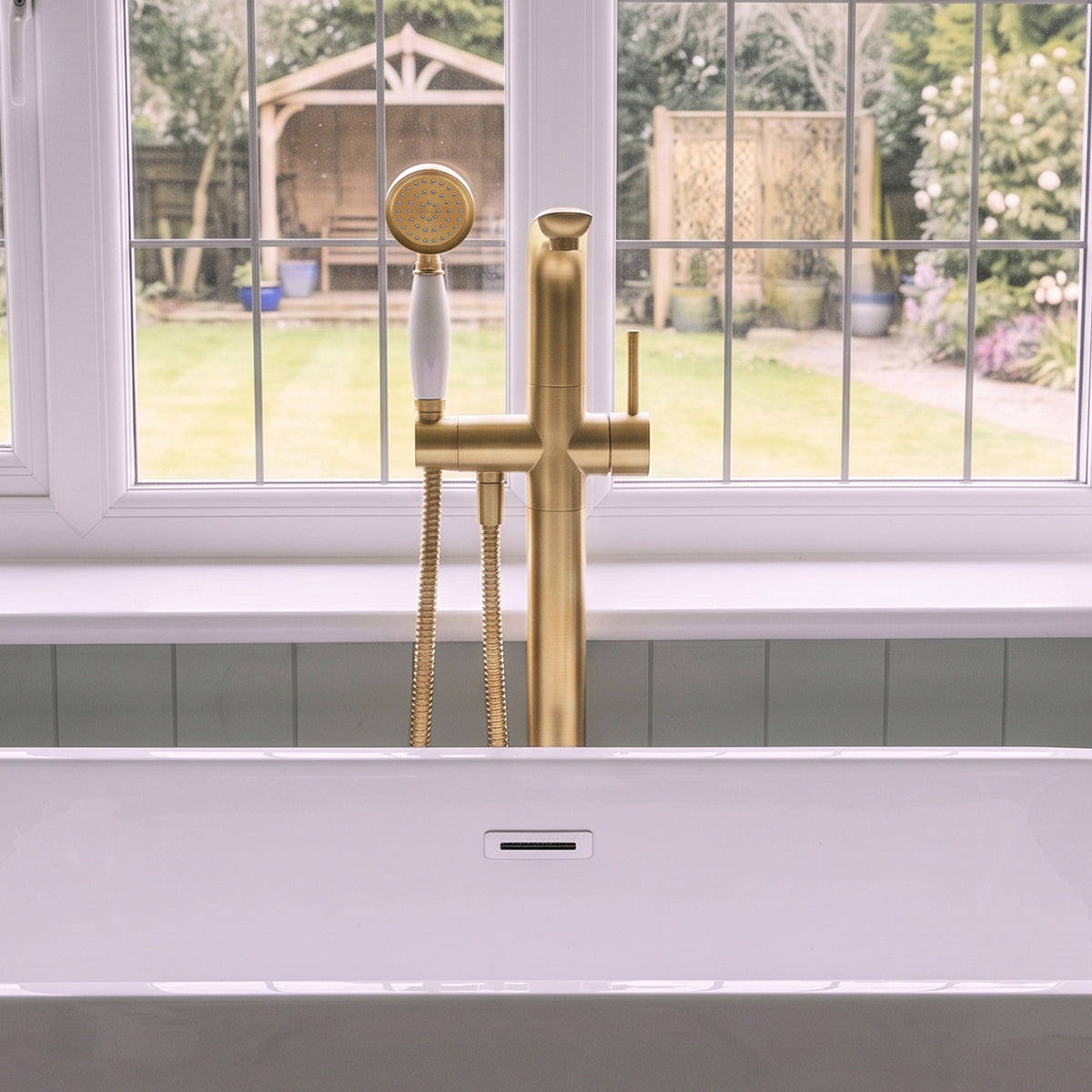 Floor-Mounted Bathtub Faucet with Hand Shower and Swivel Spout